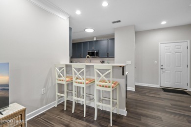 Welcome to this beautifully updated, first-floor furnished condo on Crow Creek Golf Club in North Carolina - for sale on GolfHomes.com, golf home, golf lot