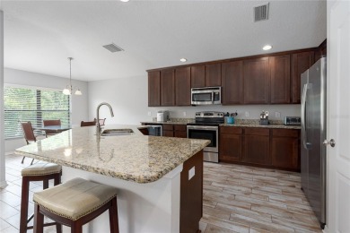 Just in time for the new school year! This spacious 4-bedroom on Imperial Lakewoods Golf Club in Florida - for sale on GolfHomes.com, golf home, golf lot