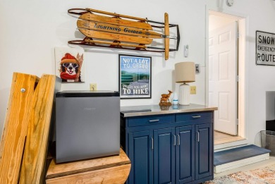 Cozy, contemporary, and full of charm--this mountain home in on Woodstone Meadows Golf Course At Massanutten in Virginia - for sale on GolfHomes.com, golf home, golf lot