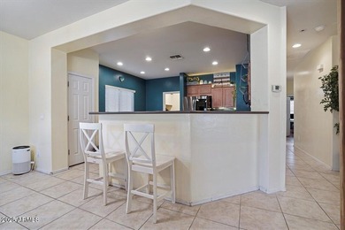 Built in 2007, this Florence single story home offers a mix of on Poston Butte Golf Club in Arizona - for sale on GolfHomes.com, golf home, golf lot