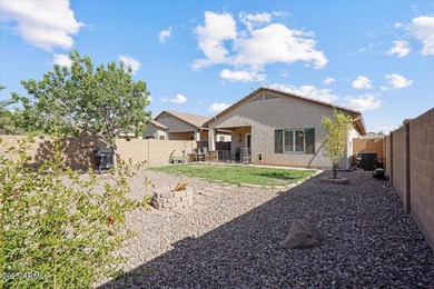 Built in 2007, this Florence single story home offers a mix of on Poston Butte Golf Club in Arizona - for sale on GolfHomes.com, golf home, golf lot