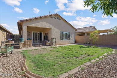 Built in 2007, this Florence single story home offers a mix of on Poston Butte Golf Club in Arizona - for sale on GolfHomes.com, golf home, golf lot