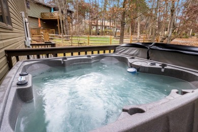 Cozy, contemporary, and full of charm--this mountain home in on Woodstone Meadows Golf Course At Massanutten in Virginia - for sale on GolfHomes.com, golf home, golf lot