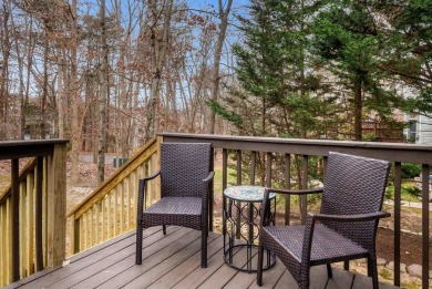 Cozy, contemporary, and full of charm--this mountain home in on Woodstone Meadows Golf Course At Massanutten in Virginia - for sale on GolfHomes.com, golf home, golf lot
