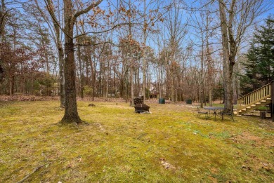 Cozy, contemporary, and full of charm--this mountain home in on Woodstone Meadows Golf Course At Massanutten in Virginia - for sale on GolfHomes.com, golf home, golf lot