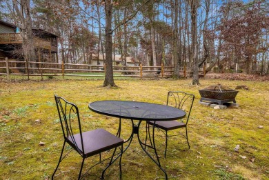 Cozy, contemporary, and full of charm--this mountain home in on Woodstone Meadows Golf Course At Massanutten in Virginia - for sale on GolfHomes.com, golf home, golf lot