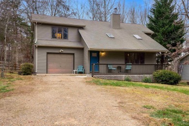 Cozy, contemporary, and full of charm--this mountain home in on Woodstone Meadows Golf Course At Massanutten in Virginia - for sale on GolfHomes.com, golf home, golf lot