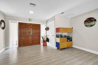 Situated on a nearly half-acre, fully fenced lot in a quiet on Pine Tree Golf Club in Florida - for sale on GolfHomes.com, golf home, golf lot