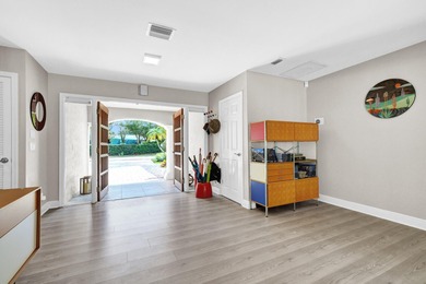 Situated on a nearly half-acre, fully fenced lot in a quiet on Pine Tree Golf Club in Florida - for sale on GolfHomes.com, golf home, golf lot