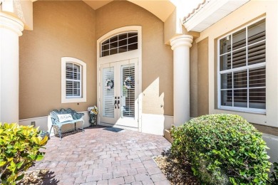 Enjoy golf & pond views from your paver lanai w/pool & spa in on The Club At Grandezza in Florida - for sale on GolfHomes.com, golf home, golf lot