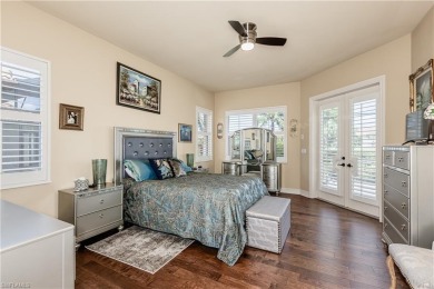 Enjoy golf & pond views from your paver lanai w/pool & spa in on The Club At Grandezza in Florida - for sale on GolfHomes.com, golf home, golf lot