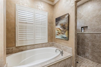 Enjoy golf & pond views from your paver lanai w/pool & spa in on The Club At Grandezza in Florida - for sale on GolfHomes.com, golf home, golf lot