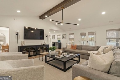 Welcome to this stunning lakefront home in the gated community on The Golf Club at Cuscowilla in Georgia - for sale on GolfHomes.com, golf home, golf lot