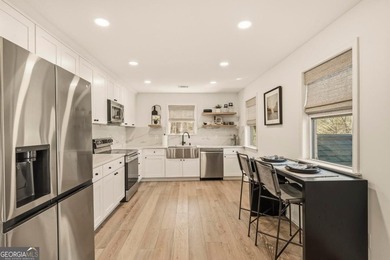 Welcome to this stunning lakefront home in the gated community on The Golf Club at Cuscowilla in Georgia - for sale on GolfHomes.com, golf home, golf lot