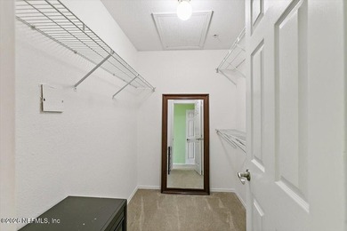 Top-Floor Condo with Golf Views | 8 Minutes to the Beach | Dual on Windsor Parke Golf Club in Florida - for sale on GolfHomes.com, golf home, golf lot