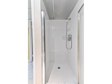WALK IN TUBPARTIAL IMPACT GLASS WINDOWSEnjoy the comfort & style on Kings Point Golf -Flanders Way in Florida - for sale on GolfHomes.com, golf home, golf lot