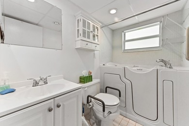 WALK IN TUB PARTIAL IMPACT GLASS WINDOWS Enjoy the comfort & on Kings Point Golf -Flanders Way in Florida - for sale on GolfHomes.com, golf home, golf lot