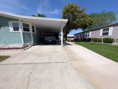 Welcome to this beautifully maintained and thoughtfully updated on Grasslands Golf and Country Club in Florida - for sale on GolfHomes.com, golf home, golf lot