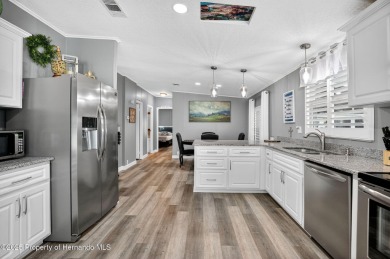 Welcome to this charming 2-bedroom, 2-bathroom home with 1,296 on Brookridge Country Club in Florida - for sale on GolfHomes.com, golf home, golf lot