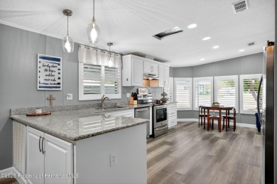 Welcome to this charming 2-bedroom, 2-bathroom home with 1,296 on Brookridge Country Club in Florida - for sale on GolfHomes.com, golf home, golf lot