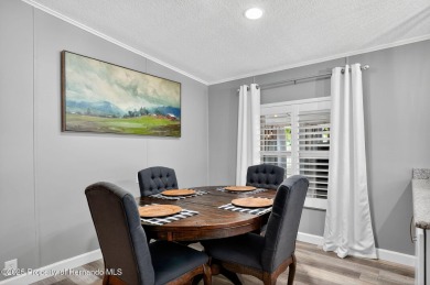 Welcome to this charming 2-bedroom, 2-bathroom home with 1,296 on Brookridge Country Club in Florida - for sale on GolfHomes.com, golf home, golf lot