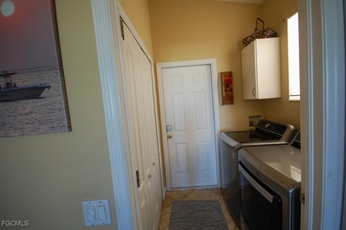 MUST SEE the lake front and golf course views with tropical on Gulf Harbour Yacht and Country Club in Florida - for sale on GolfHomes.com, golf home, golf lot