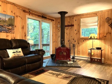 This house sits on a lot that is surrounded by common land so it on Hermitage Club Golf Course in Vermont - for sale on GolfHomes.com, golf home, golf lot