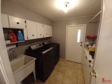 Come find your home sweet home in a beautiful manufactured home on Fairways Country Club in Florida - for sale on GolfHomes.com, golf home, golf lot