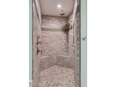 This beautifully renovated home in Wyldewood Lakes has over 1500 on Whiskey Creek Country Club in Florida - for sale on GolfHomes.com, golf home, golf lot