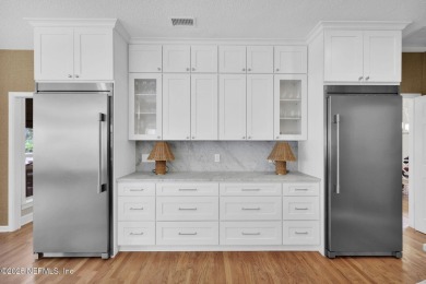 Tailored for the Sophisticated Buyer! This elegantly reimagined on Marsh Landing Country Club - Saint Johns County in Florida - for sale on GolfHomes.com, golf home, golf lot