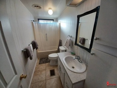 Come find your home sweet home in a beautiful manufactured home on Fairways Country Club in Florida - for sale on GolfHomes.com, golf home, golf lot