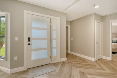 High and Dry, Beautifully Renovated, and Fully Furnished, this on Longboat Key Golf Club Resort in Florida - for sale on GolfHomes.com, golf home, golf lot