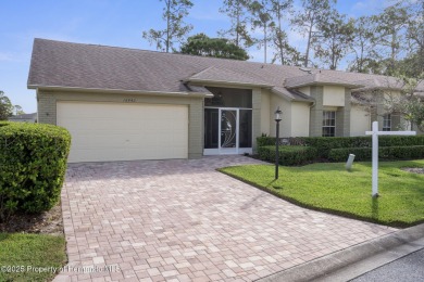 Model Perfect Luxury Villa with Golf Course Views! Discover on Heritage Pines Country Club in Florida - for sale on GolfHomes.com, golf home, golf lot