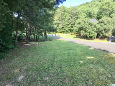 This lot has a nice building site with a view overlooking the on Heritage Green  Golf Course in Alabama - for sale on GolfHomes.com, golf home, golf lot