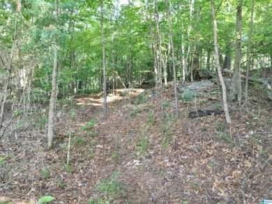 This lot has a nice building site with a view overlooking the on Heritage Green  Golf Course in Alabama - for sale on GolfHomes.com, golf home, golf lot