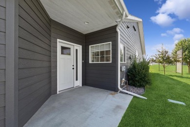 Experience easy living in this beautifully designed single-level on Village Greens Golf Club in Montana - for sale on GolfHomes.com, golf home, golf lot