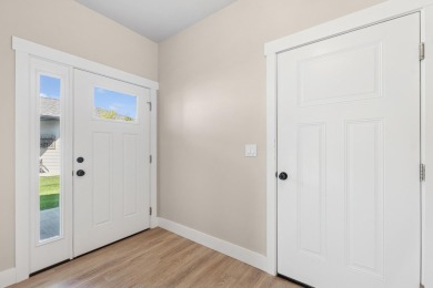 Experience easy living in this beautifully designed single-level on Village Greens Golf Club in Montana - for sale on GolfHomes.com, golf home, golf lot