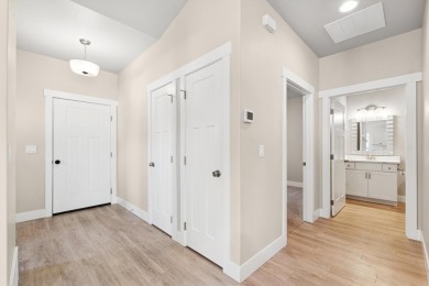 Experience easy living in this beautifully designed single-level on Village Greens Golf Club in Montana - for sale on GolfHomes.com, golf home, golf lot