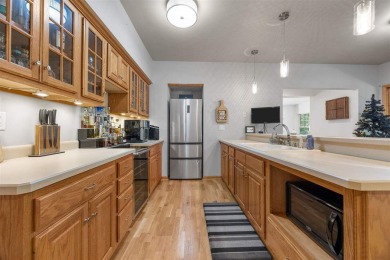 Welcome Home! This Amana Society custom built 5 Bedroom 3 1/2 on Amana Colonies Golf Course in Iowa - for sale on GolfHomes.com, golf home, golf lot