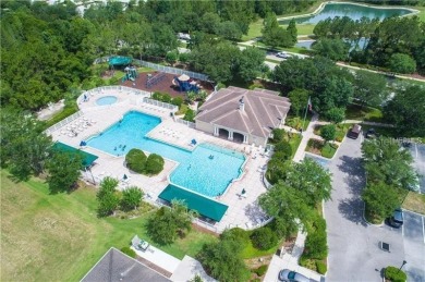 Under contract-accepting backup offers. This beautiful 3-bedroom on Lexington Oaks Golf Club in Florida - for sale on GolfHomes.com, golf home, golf lot