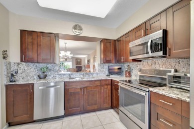 This hard to find TOP FLOOR, CORNER, condo in Coral Lakes (55+) on Westchester Golf and Country Club in Florida - for sale on GolfHomes.com, golf home, golf lot