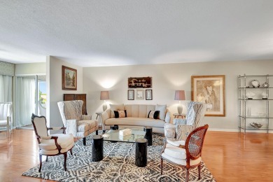 This hard to find TOP FLOOR, CORNER, condo in Coral Lakes (55+) on Westchester Golf and Country Club in Florida - for sale on GolfHomes.com, golf home, golf lot