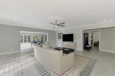 This stunning 3-bedroom, 2-bathroom lakefront home in the highly on Boca Royale Golf and Country Club in Florida - for sale on GolfHomes.com, golf home, golf lot