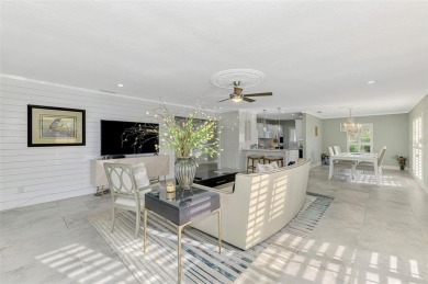 This stunning 3-bedroom, 2-bathroom lakefront home in the highly on Boca Royale Golf and Country Club in Florida - for sale on GolfHomes.com, golf home, golf lot