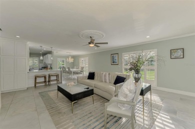 This stunning 3-bedroom, 2-bathroom lakefront home in the highly on Boca Royale Golf and Country Club in Florida - for sale on GolfHomes.com, golf home, golf lot