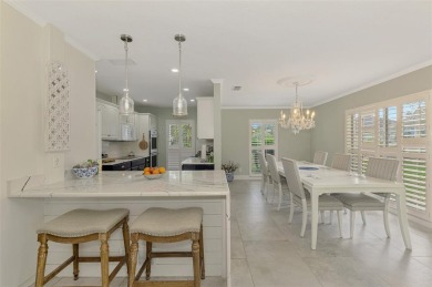 This stunning 3-bedroom, 2-bathroom lakefront home in the highly on Boca Royale Golf and Country Club in Florida - for sale on GolfHomes.com, golf home, golf lot