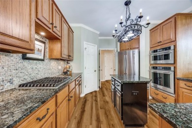Nestled in the heart of Coppell, this beautifully renovated on Riverchase Golf Club in Texas - for sale on GolfHomes.com, golf home, golf lot