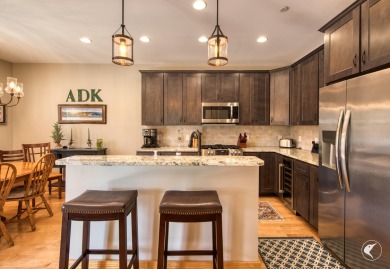Discover the epitome of Adirondack luxury at The Lodges, the on Whiteface Club and Resort in New York - for sale on GolfHomes.com, golf home, golf lot