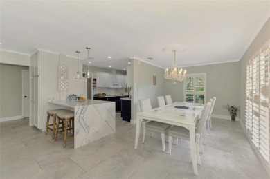 This stunning 3-bedroom, 2-bathroom lakefront home in the highly on Boca Royale Golf and Country Club in Florida - for sale on GolfHomes.com, golf home, golf lot