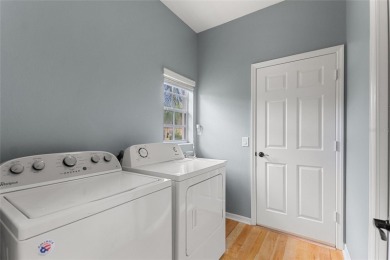 One or more photo(s) has been virtually staged. Corner lot on Ridgewood Lakes Golf and Country Club in Florida - for sale on GolfHomes.com, golf home, golf lot